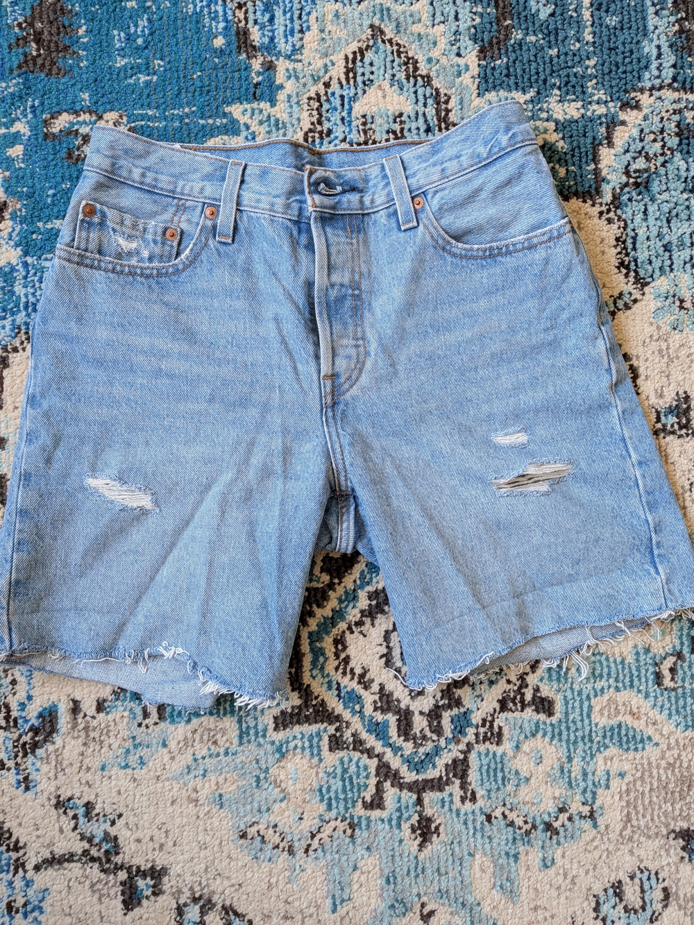 Levi's Light Blue Distressed Denim Shorts